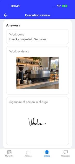 Reviewing a submitted task: work notes, a photo of the café counter as evidence, and the manager’s signature